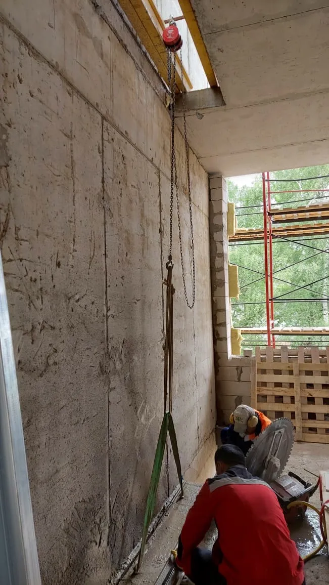 Clean rectangular saw-cut opening in an interior wall of a finished room